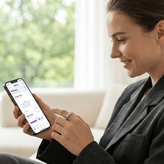 Woman reviewing SKY Ring AI health insights on her phone